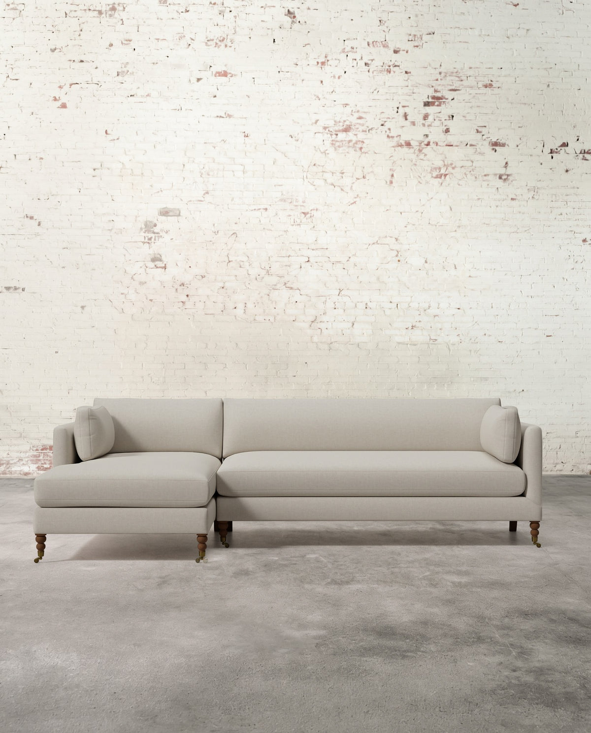 Francis Left Facing Sectional with Brass Casters
