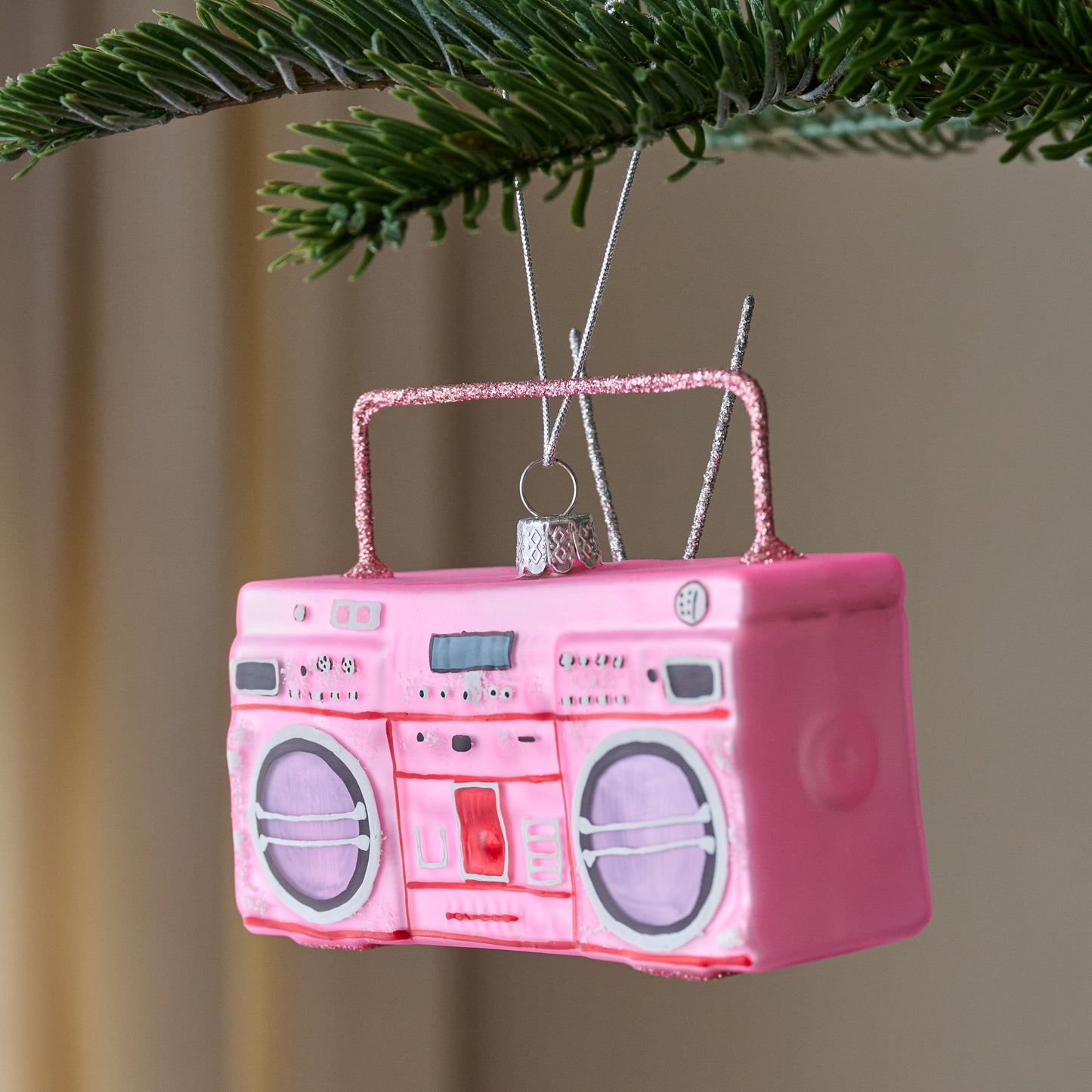 Pink Retro Boombox Ornament shown hung on tree