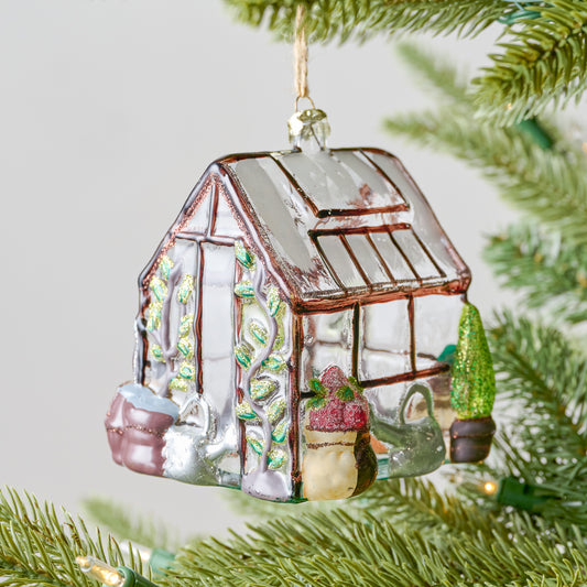 Greenhouse Ornament shown on tree