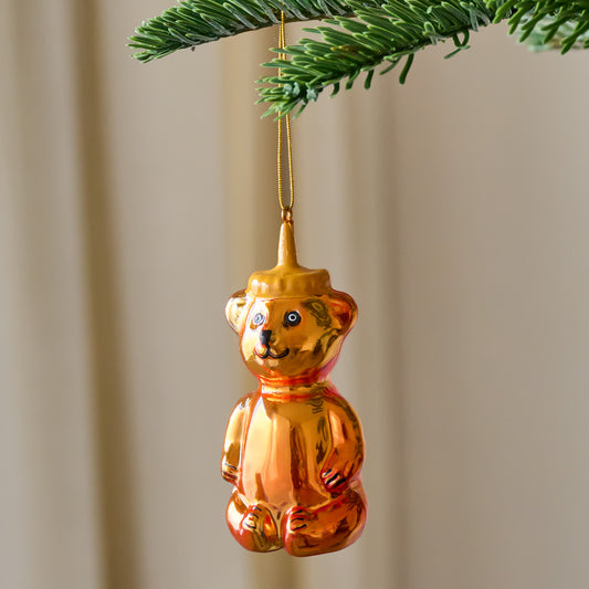 Honey Bear Ornament shown hung from tree