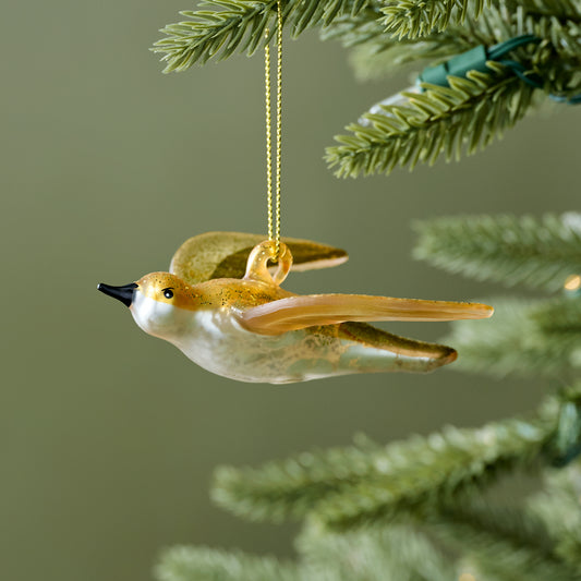 Gilded Swallow Glass Ornament shown on tree