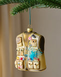 Fisherman's Favorite Vest Ornament shown hung on tree