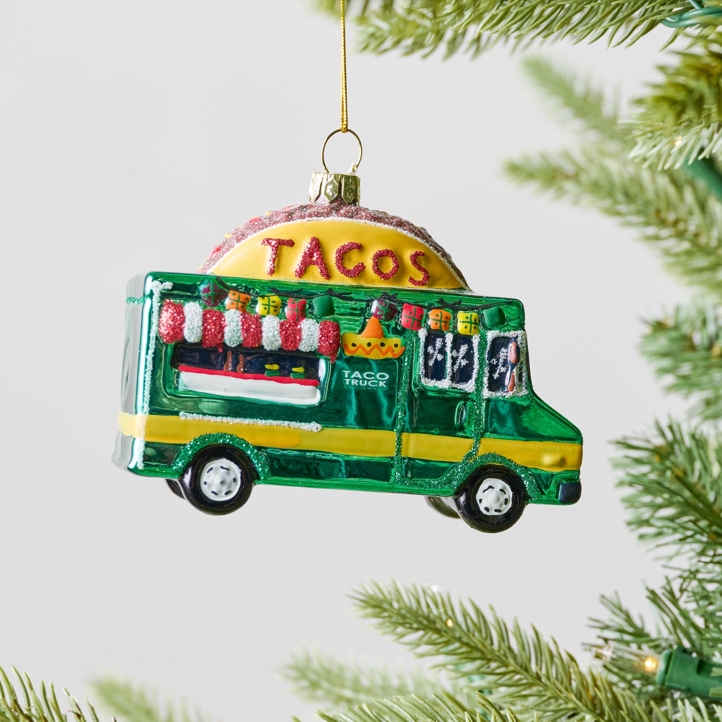 Taco Truck Ornament shown on tree