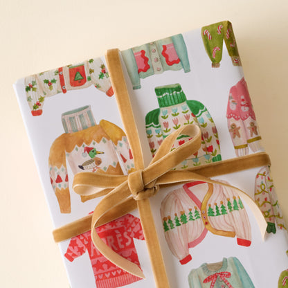 Holiday Sweater Gift Wrap Sheets shown on gift
