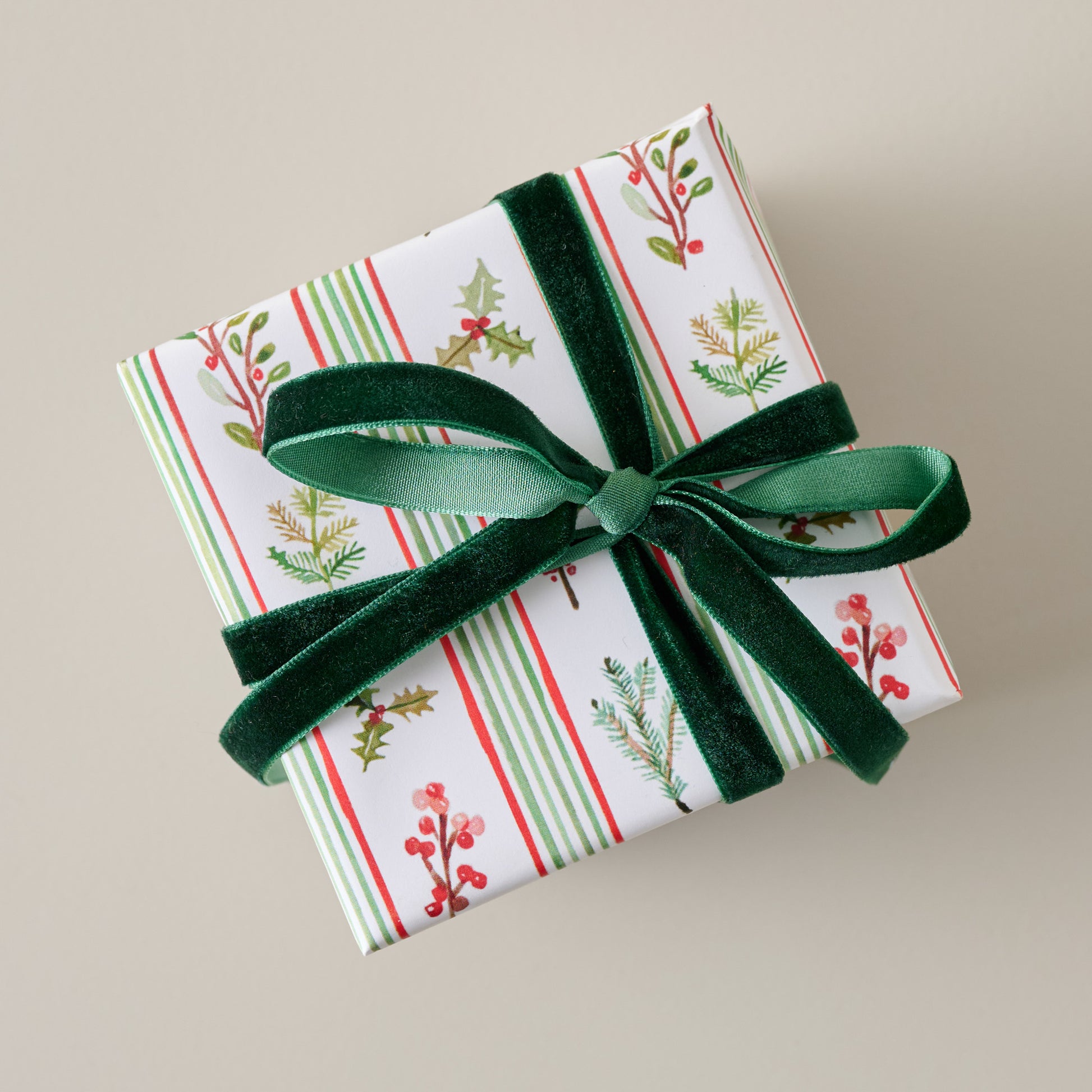 Holiday Garland Gift Wrap Sheets shown on gift