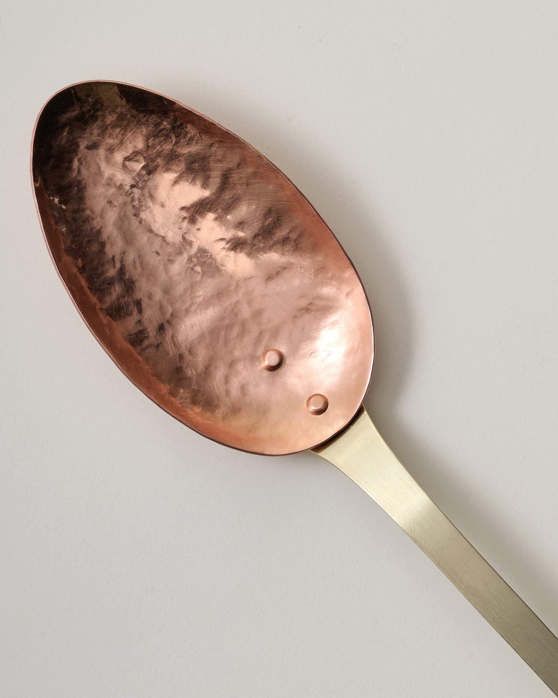 Handmade Hammered Copper + Brass Spoon close up