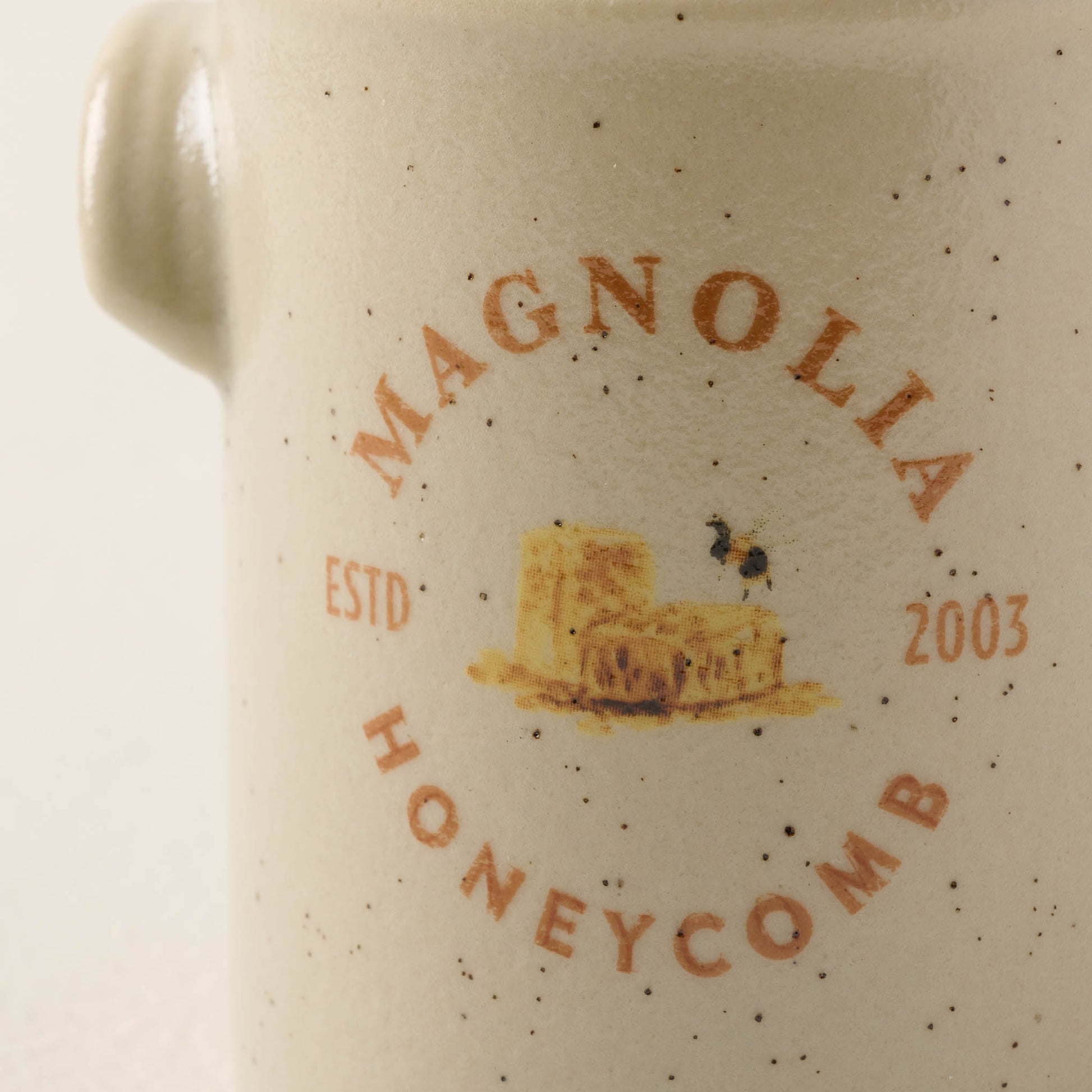 close up view of honeycomb candle label