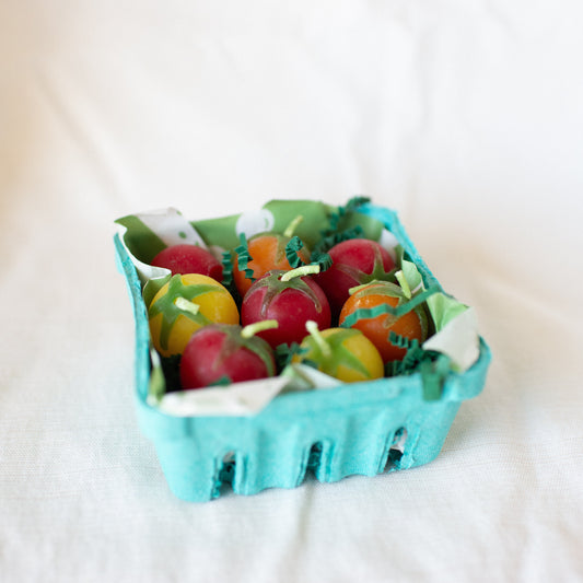 Cherry Tomato Birthday Candle Set of 8 shown in carton