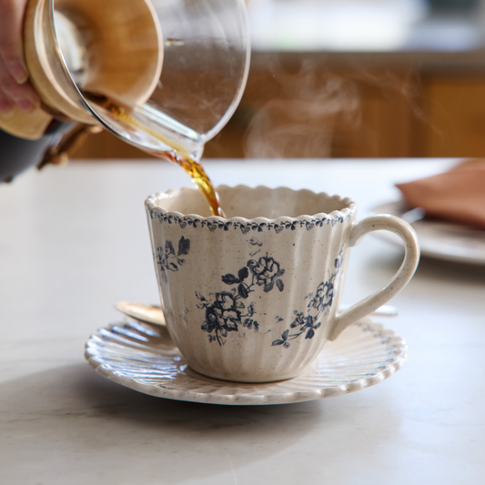 Heirloom Garden Navy Floral Tea Set with coffee pouring