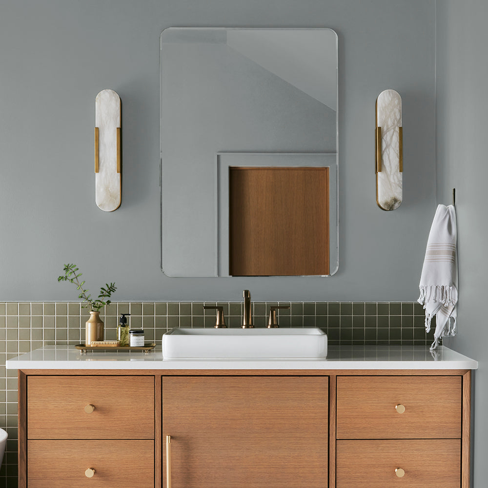neutral grey with a tinge of blue paint color named tranquil waters shown painted on bathroom wall