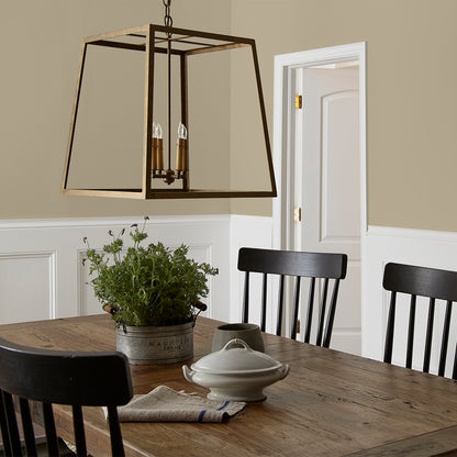 sunwashed green paint color named juniper tree shown painted on dining room wall