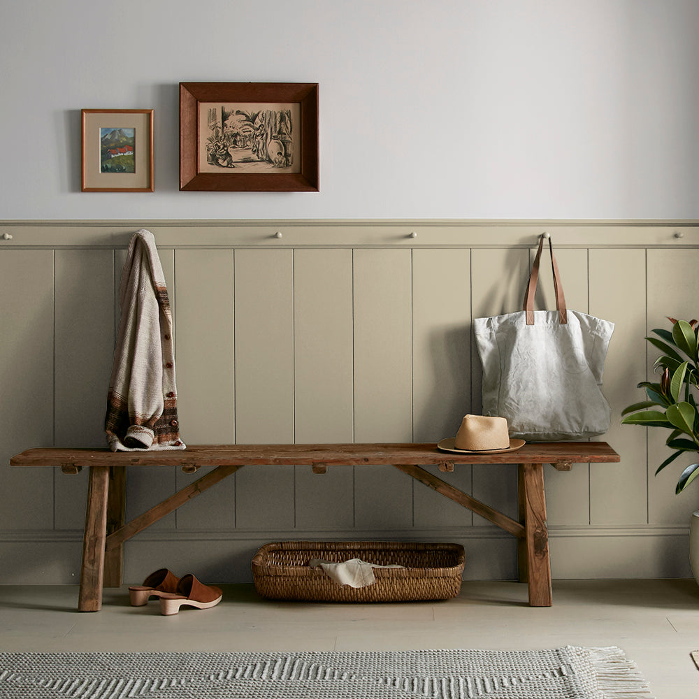sunwashed green paint color named juniper tree shown painted on entryway wall