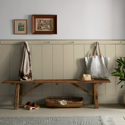 sunwashed green paint color named juniper tree shown painted on entryway wall
