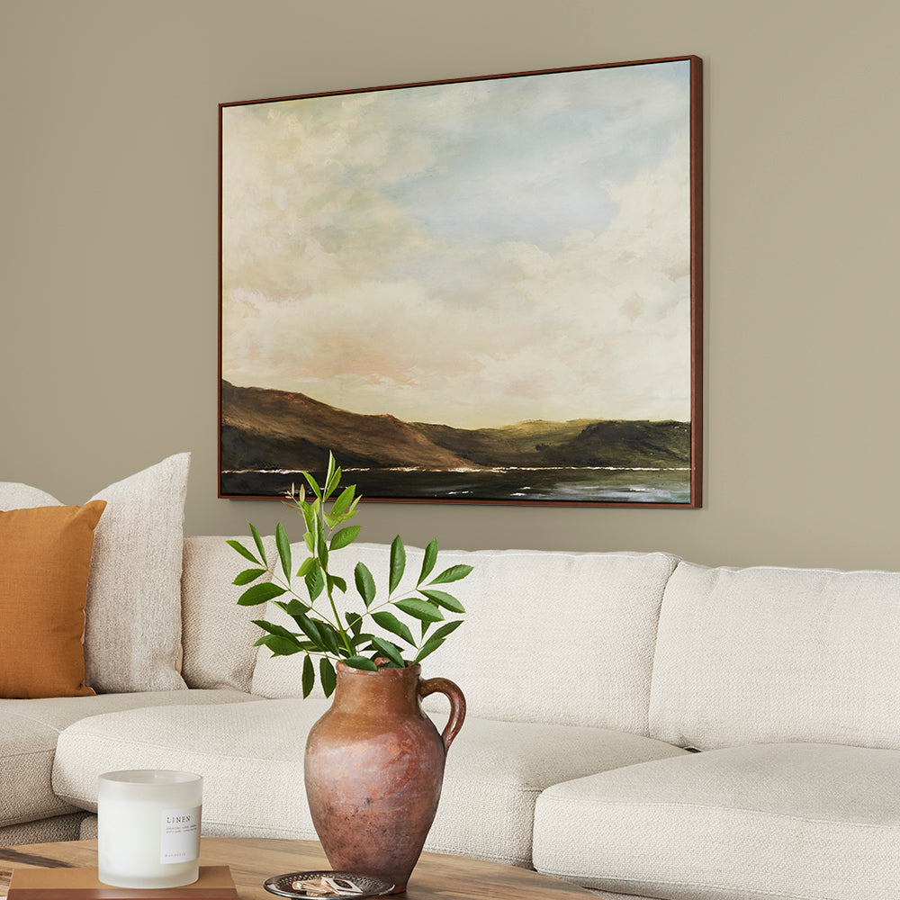 sunwashed green paint color named juniper tree shown painted on living room wall