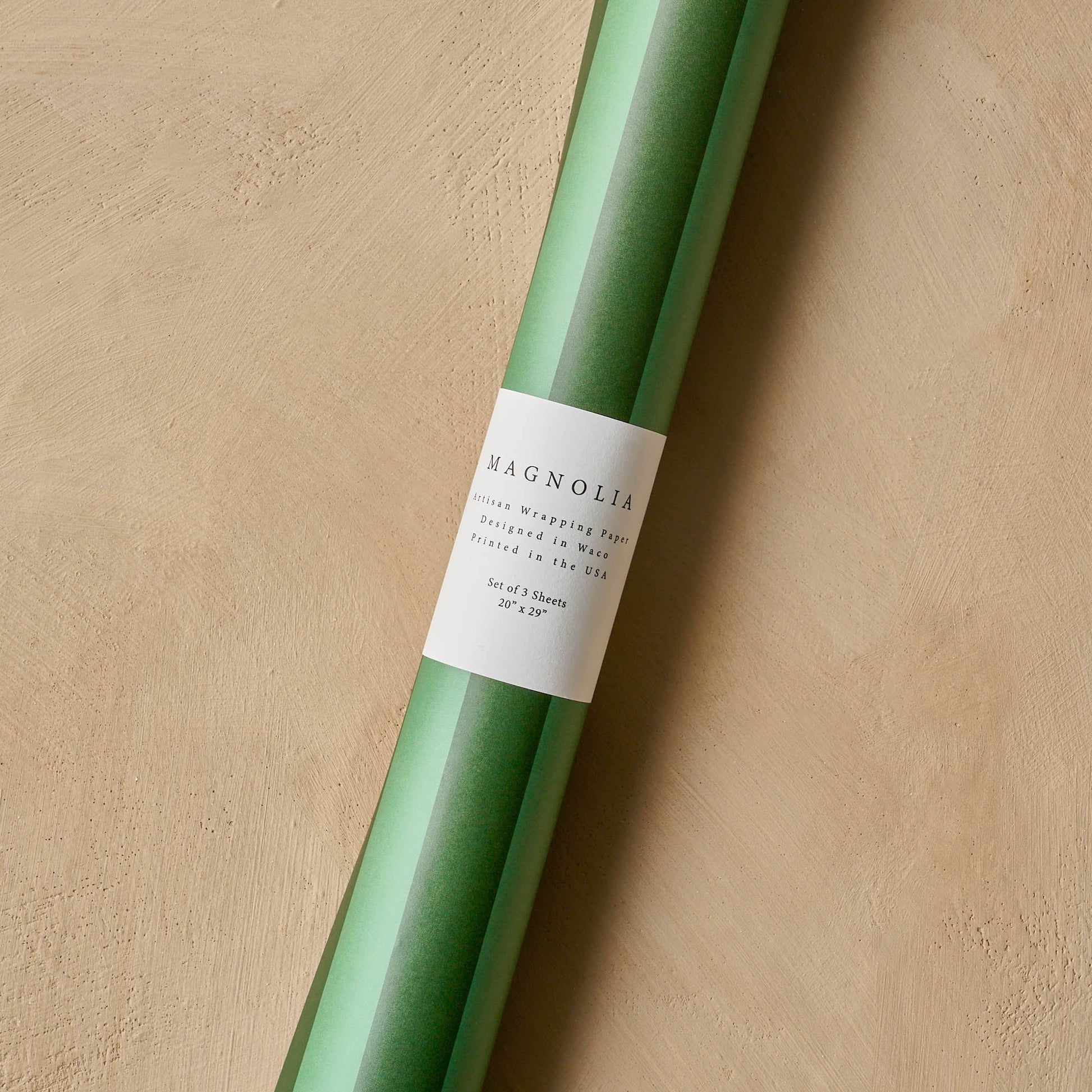 Magnolia Green Stripes Wrapping Paper Sheets wrapped into a tube