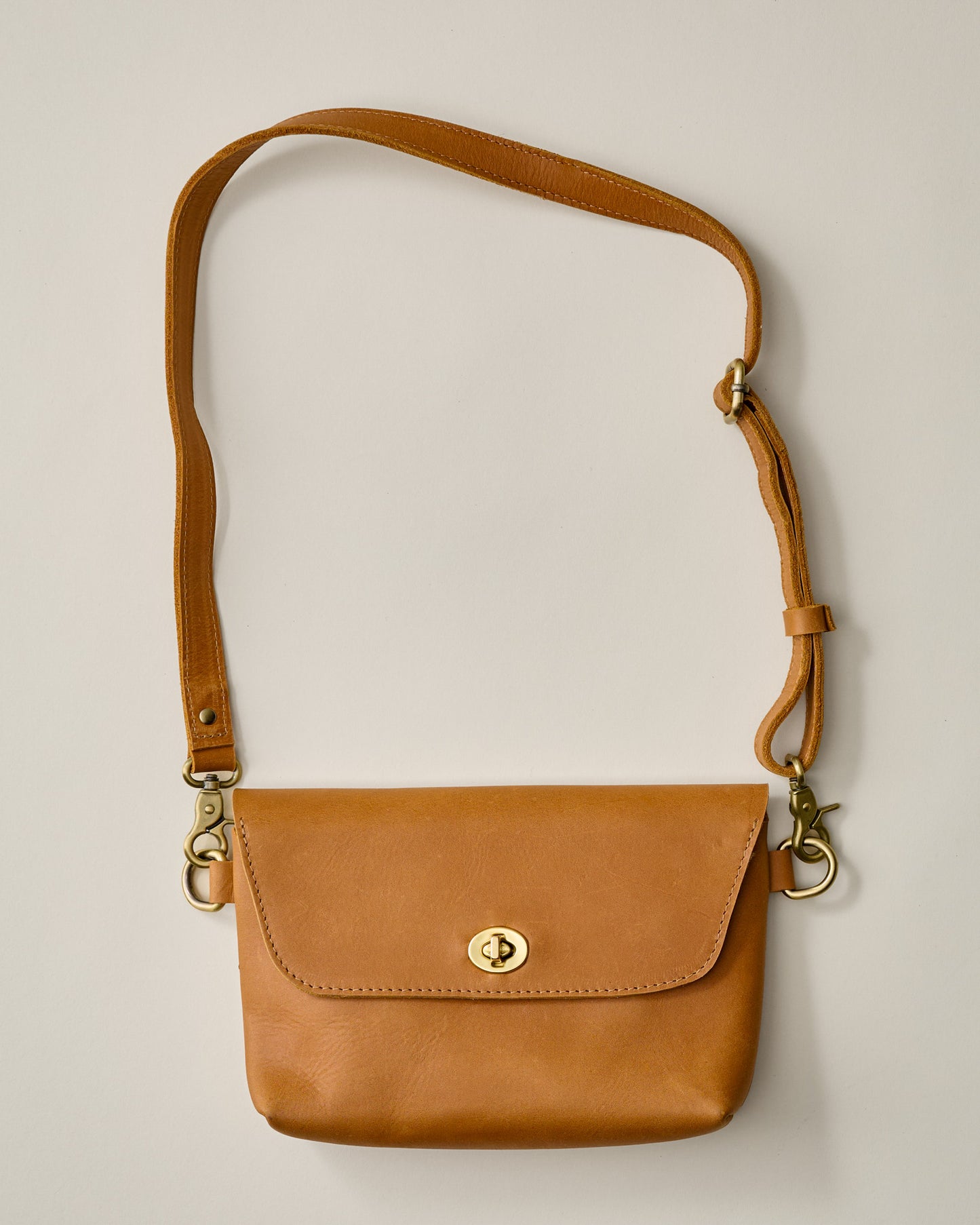 Turnlock Tan Crossbody Bag