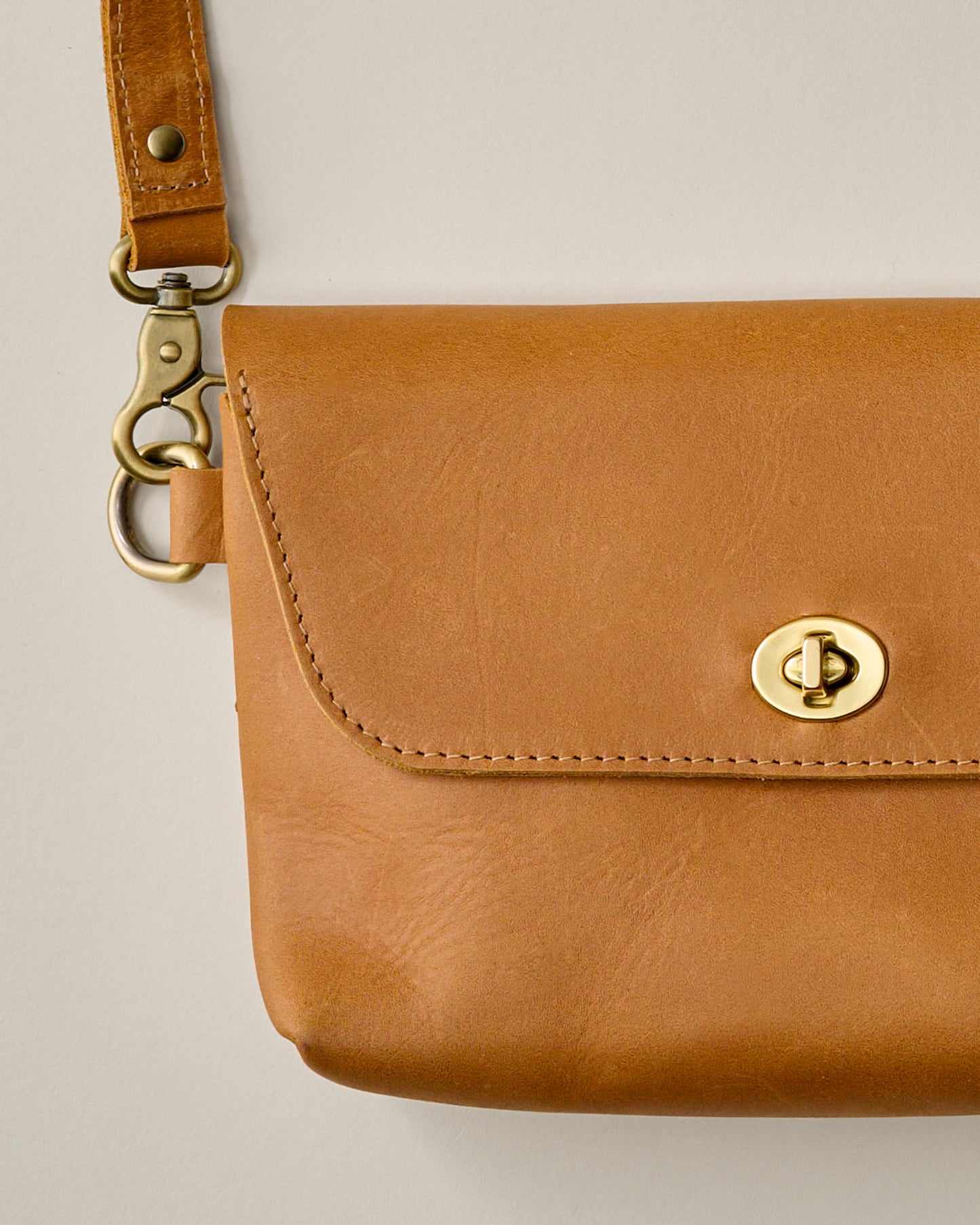 Turnlock Tan Crossbody Bag