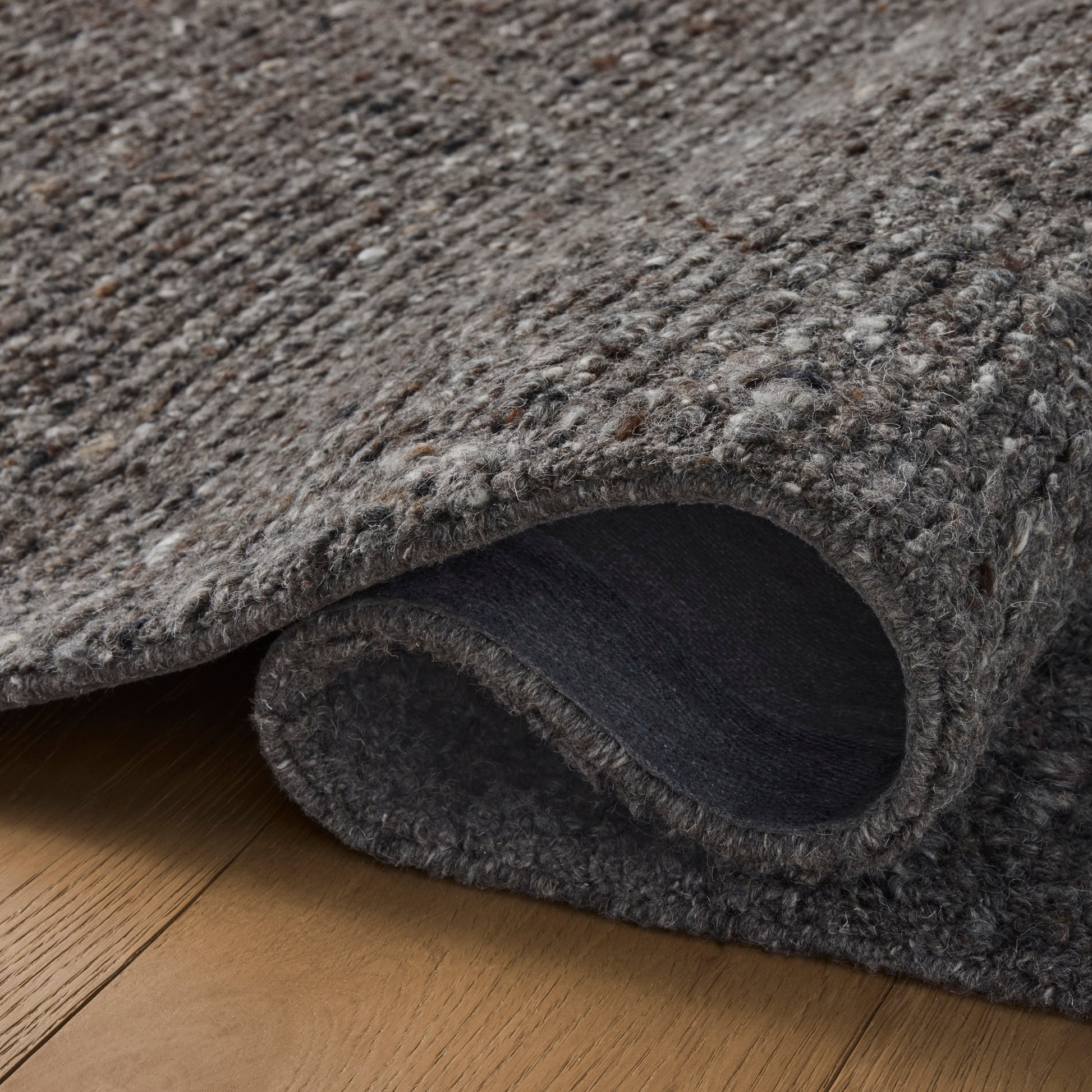 Jones Granite Rug close up of rolled rug