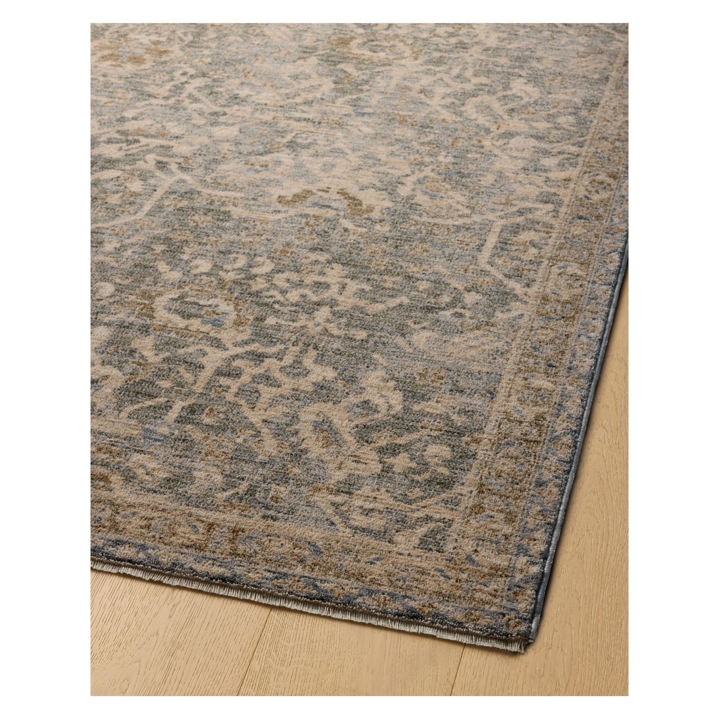 Junie Blue Natural Rug shown from a certain viewing angle