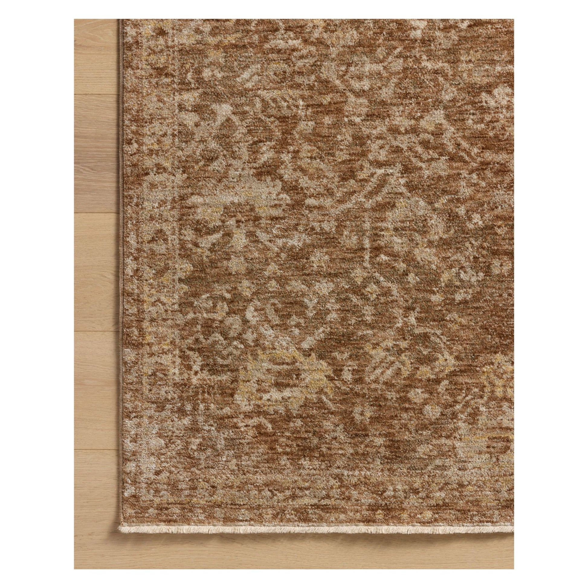 Junie Clay Natural Rug corner on hardwood