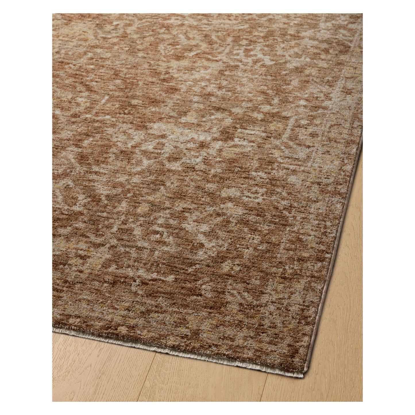 Junie Clay Natural Rug corner shown from a viewing angle