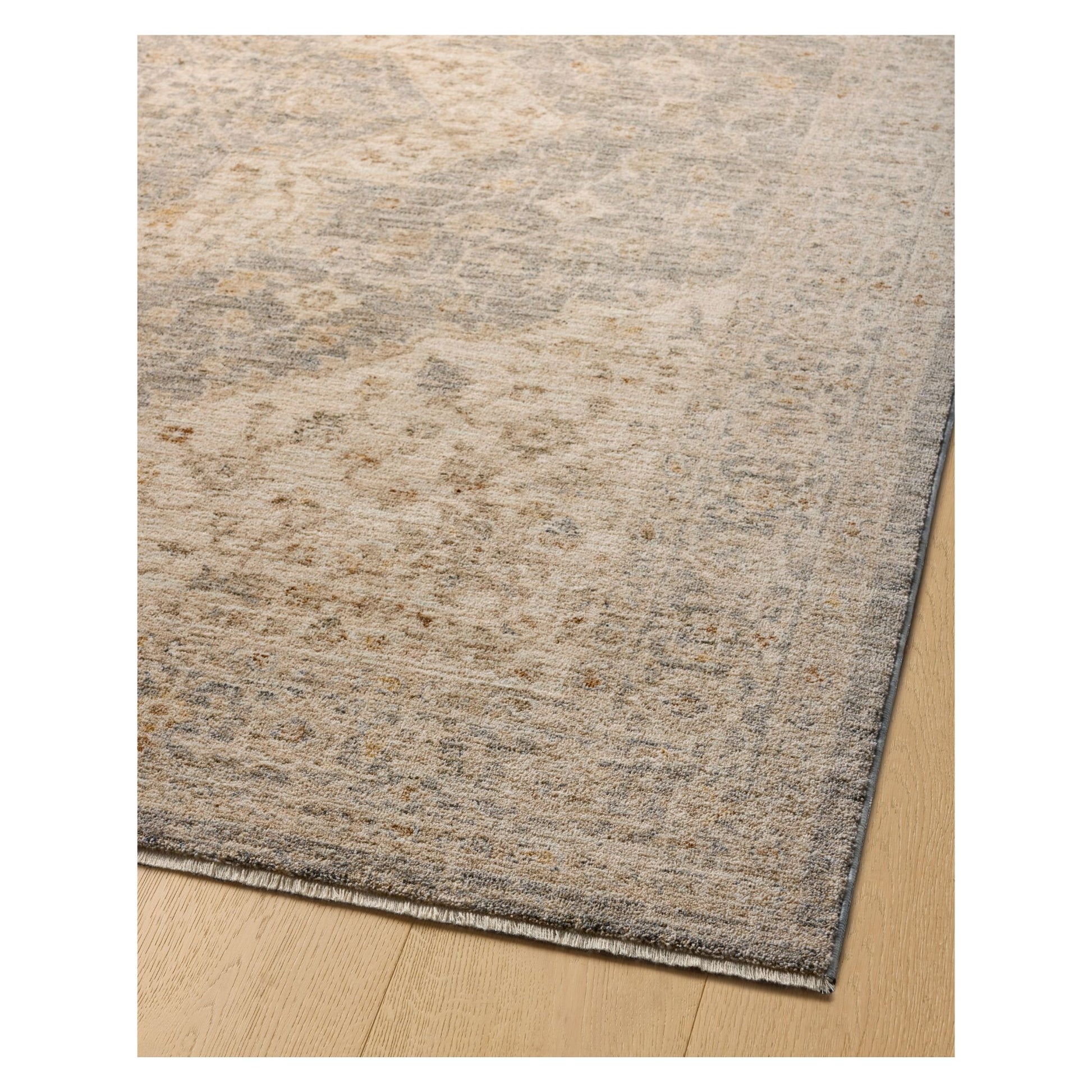 Junie Denim Natural Rug corner shown from a viewing angle