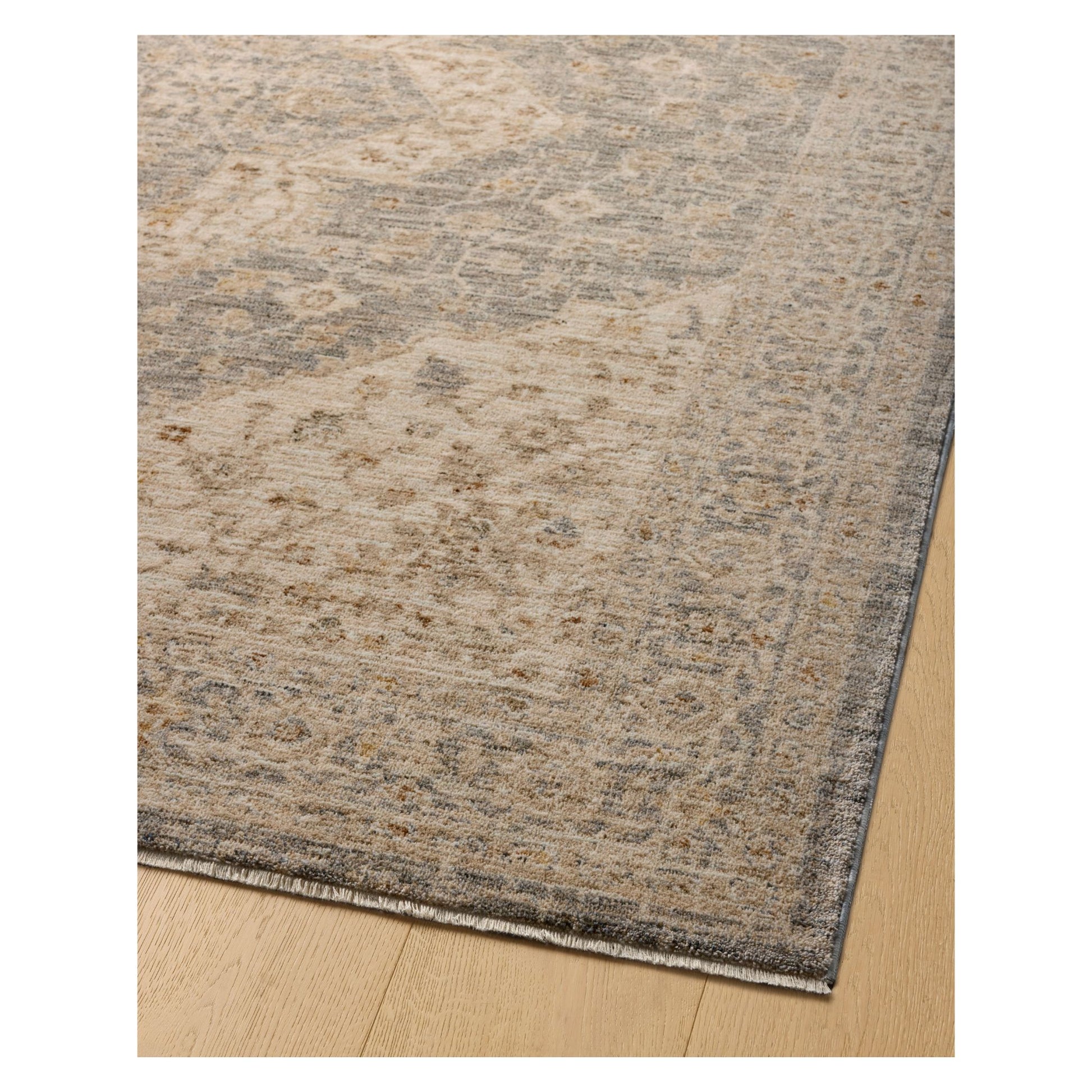 Junie Denim Natural Rug corner shown from a viewing angle