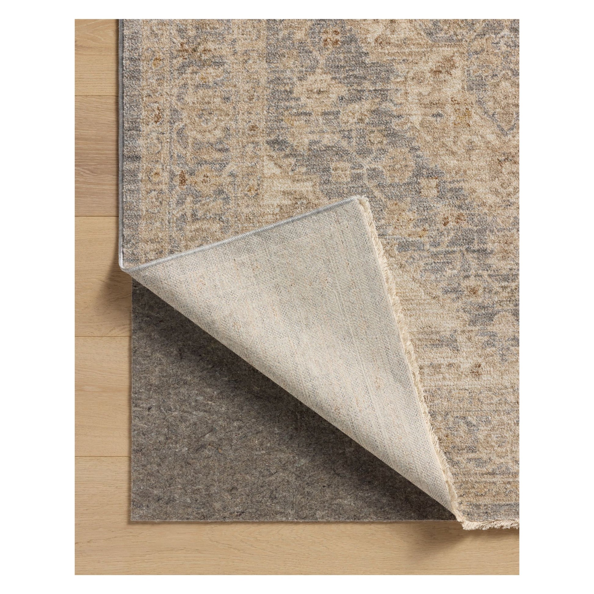 Junie Denim Natural Rug corner shown flipped up