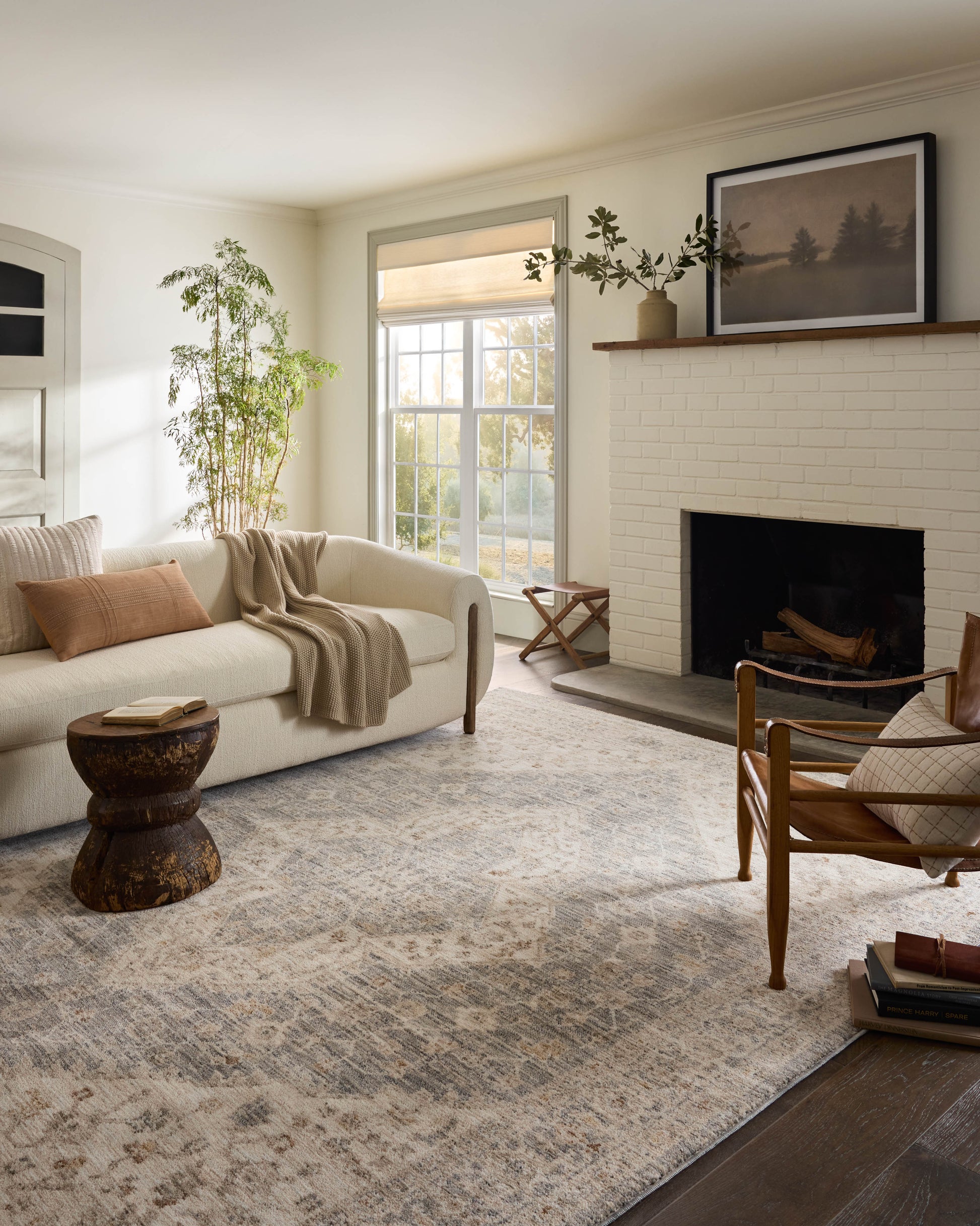 Junie Denim Natural Rug shown in bright living room