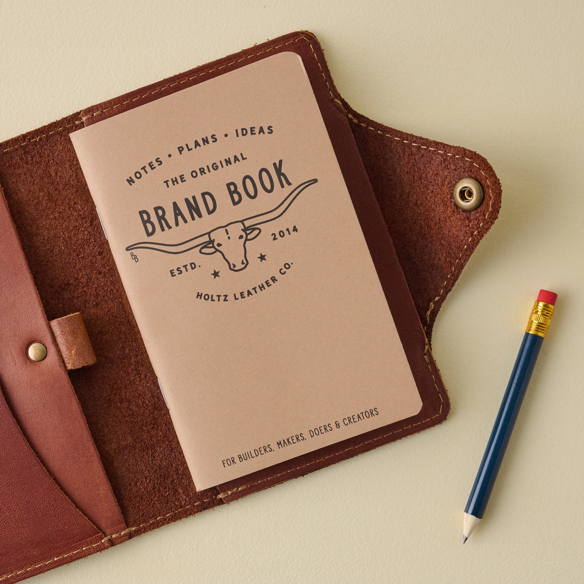 Magnolia Leather Logbook open with pencil