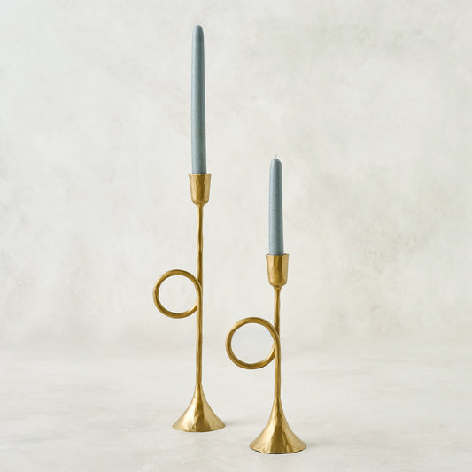Brass Antique Inspired Trumpet Taperholders shown with blue tapers