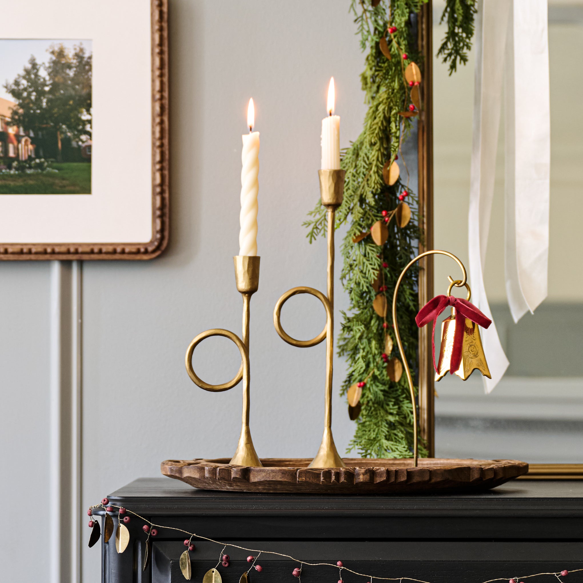 Antique Inspired Trumpet Taper Holders in a room