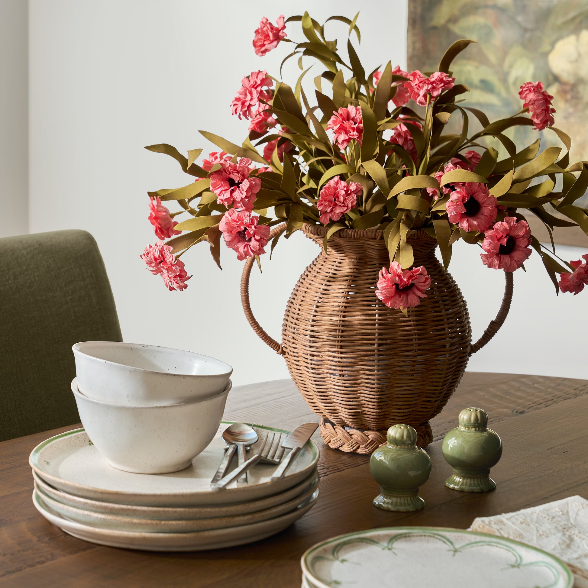 Pink Wildflower Bush shown in vase on dining room table