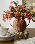 Mabel Rattan Vase shown on dining room table