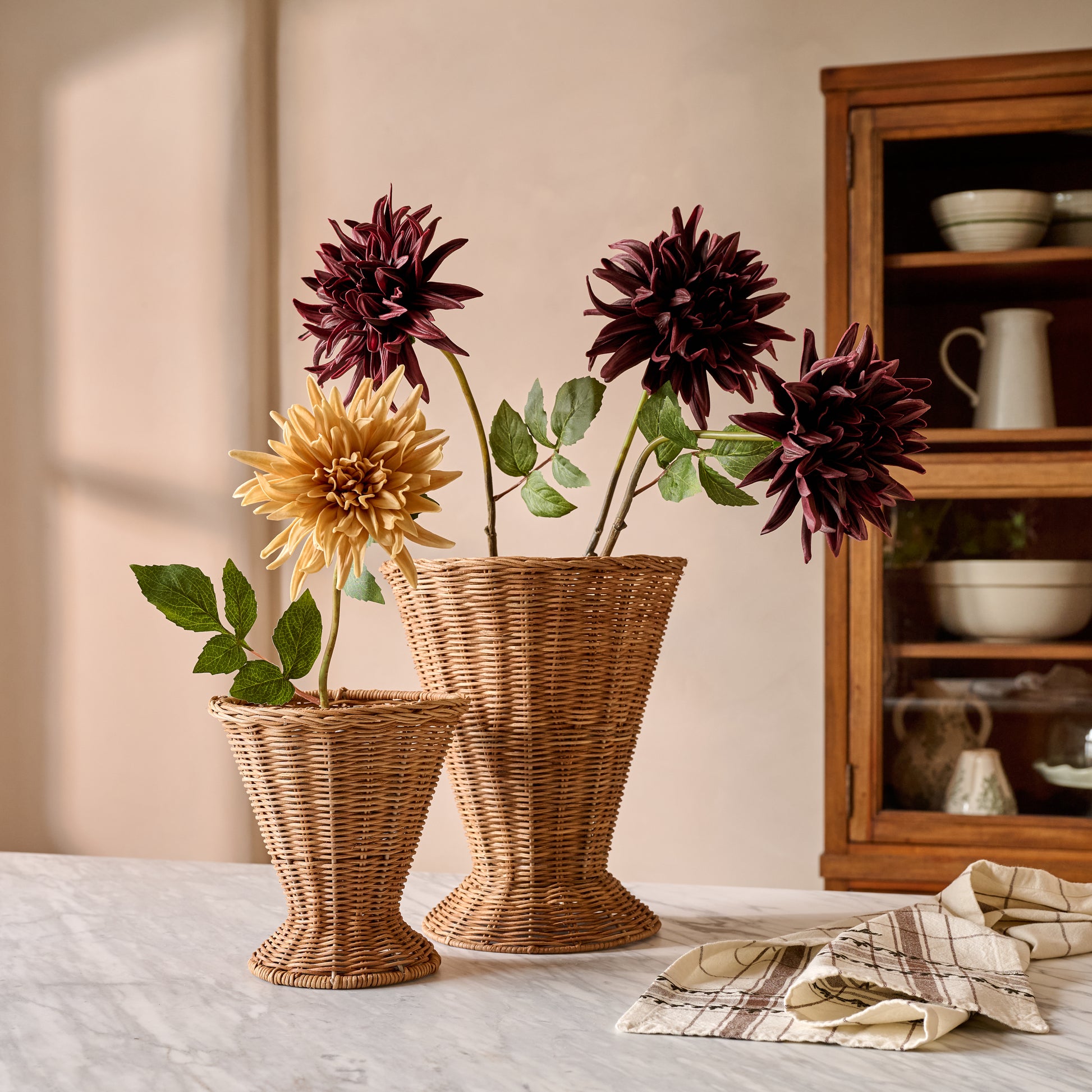 Atlas Woven Rattan Vase shown with florals