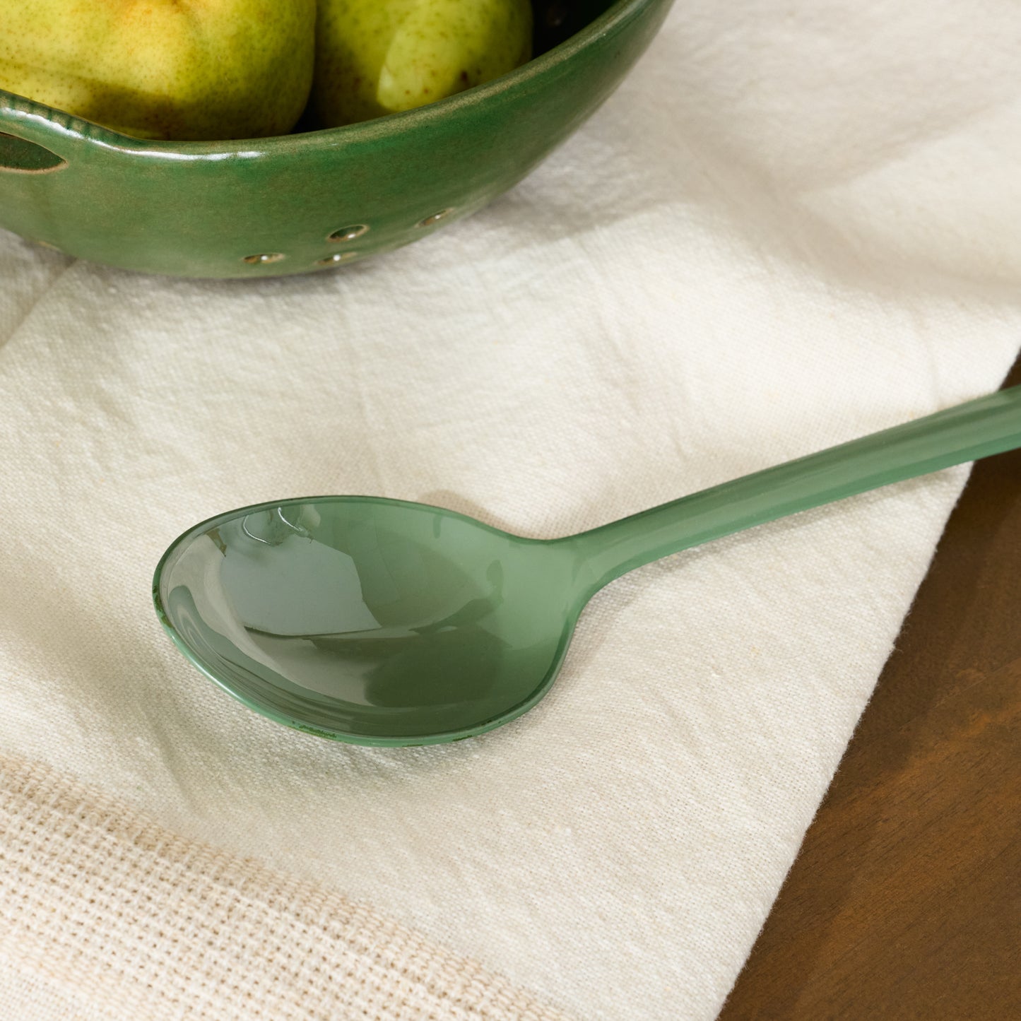 Vineyard Green Enamel Spoon up close