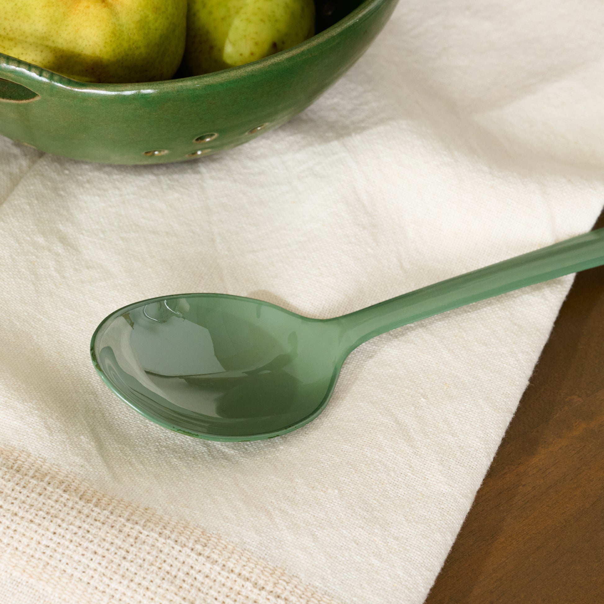 Vineyard Green Enamel Spoon up close