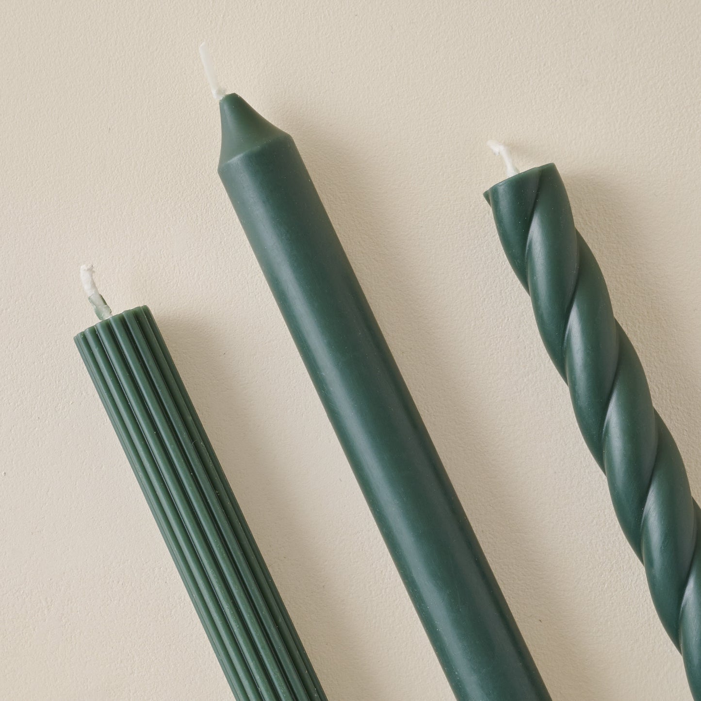 Assorted Forest Green Taper Set up close