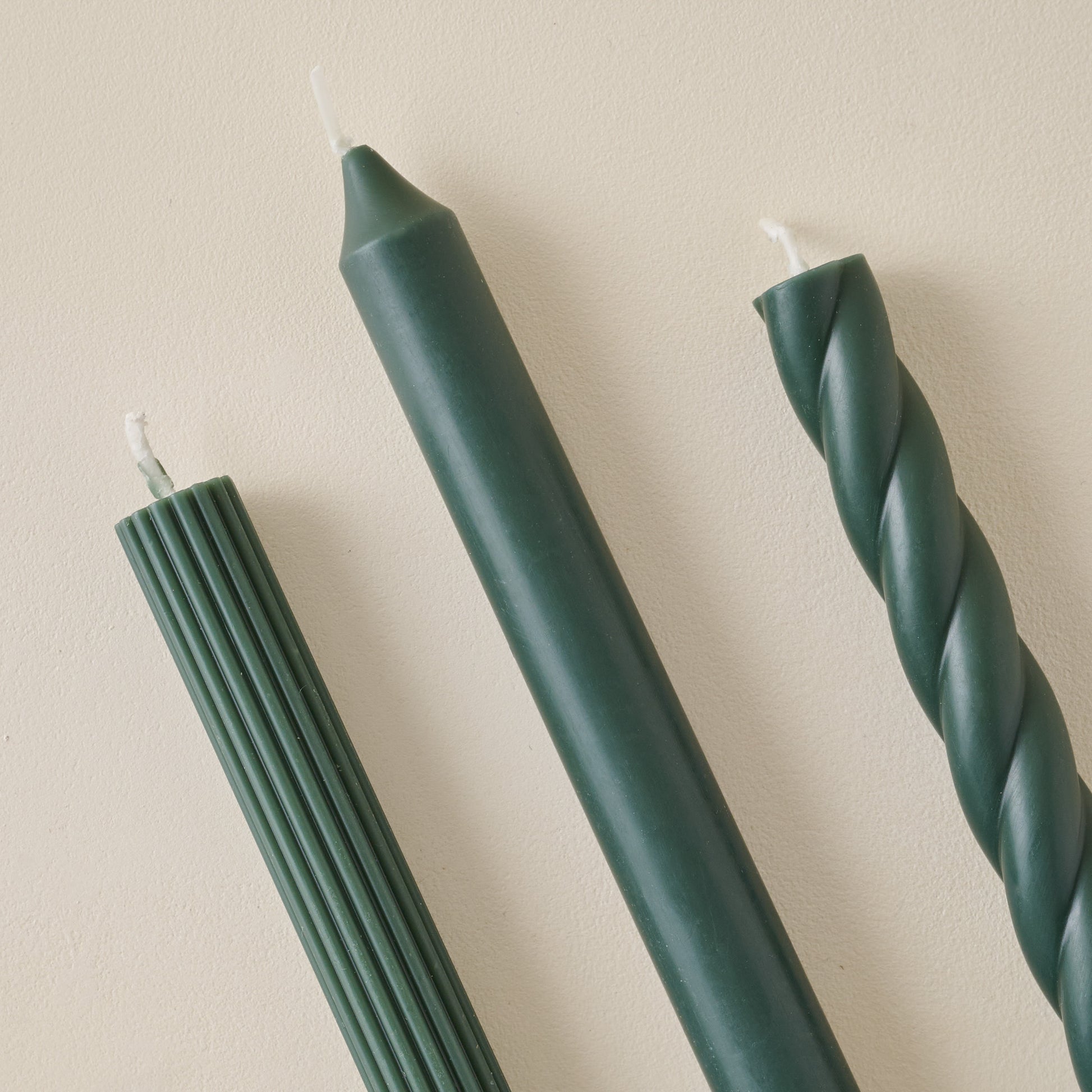 Assorted Forest Green Taper Set up close
