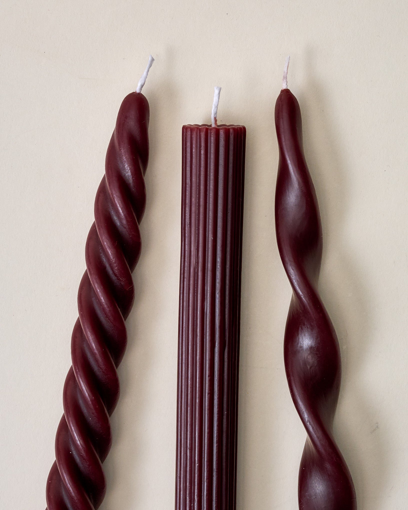 Assorted Drippy Taper Candle - Burgundy close up