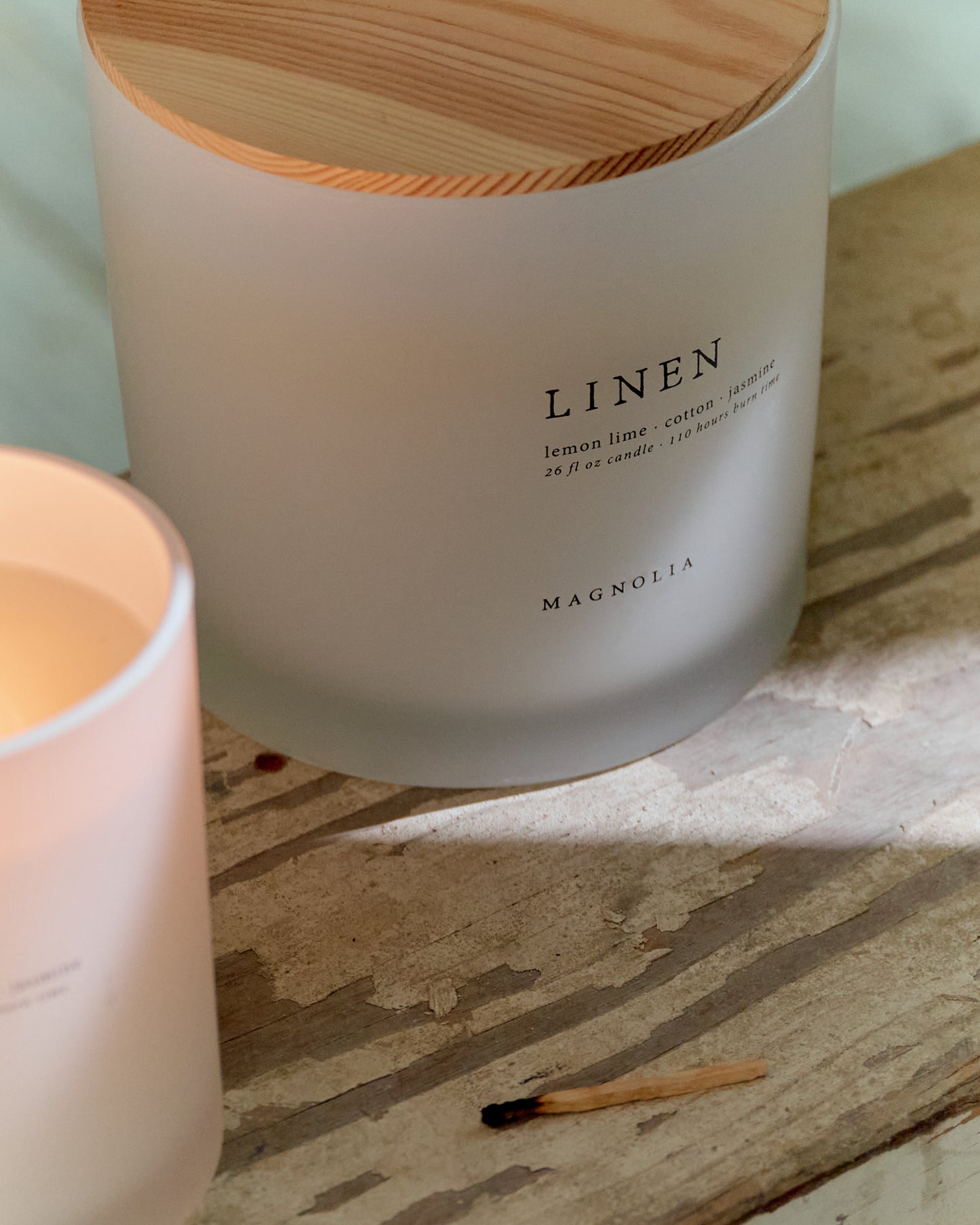 Magnolia Linen Candle angled close up view