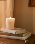 Connect Candle on top of books on desk