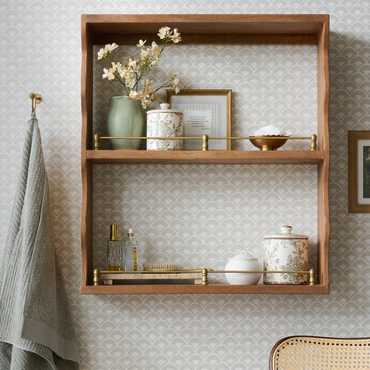 Both sizes of Green and White Distressed Canister on a shelf in a bathroom