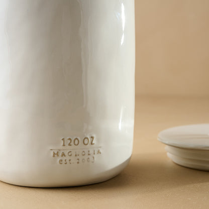 Mia Ceramic Canister close up of logo and Oz label