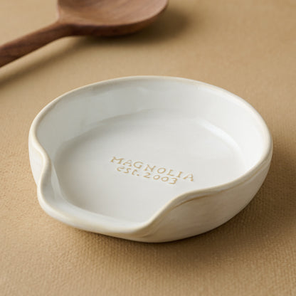 Magnolia Est. Spoon Rest with spoon in the background