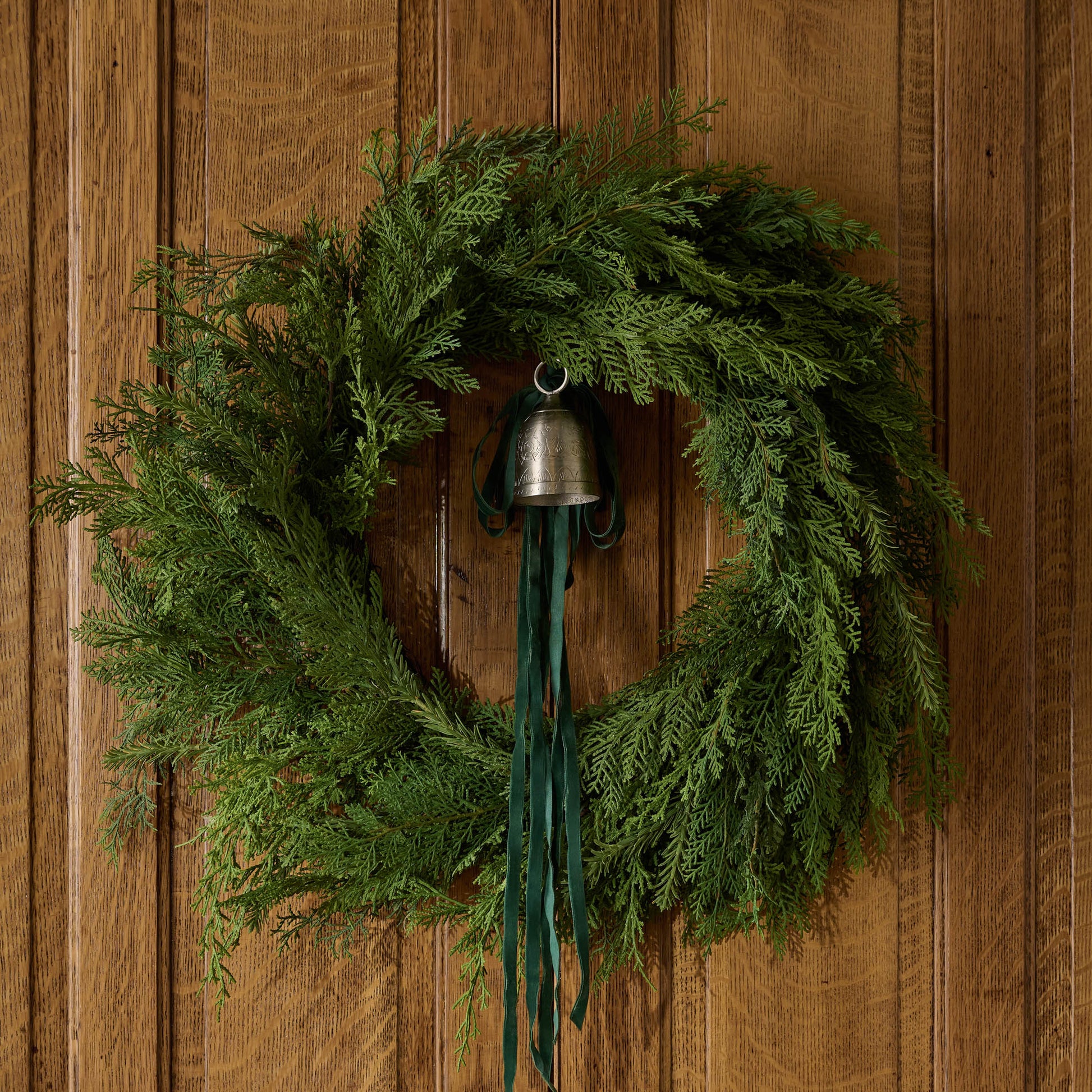 Real Touch Cedar Mix Wreath with a bell and bow