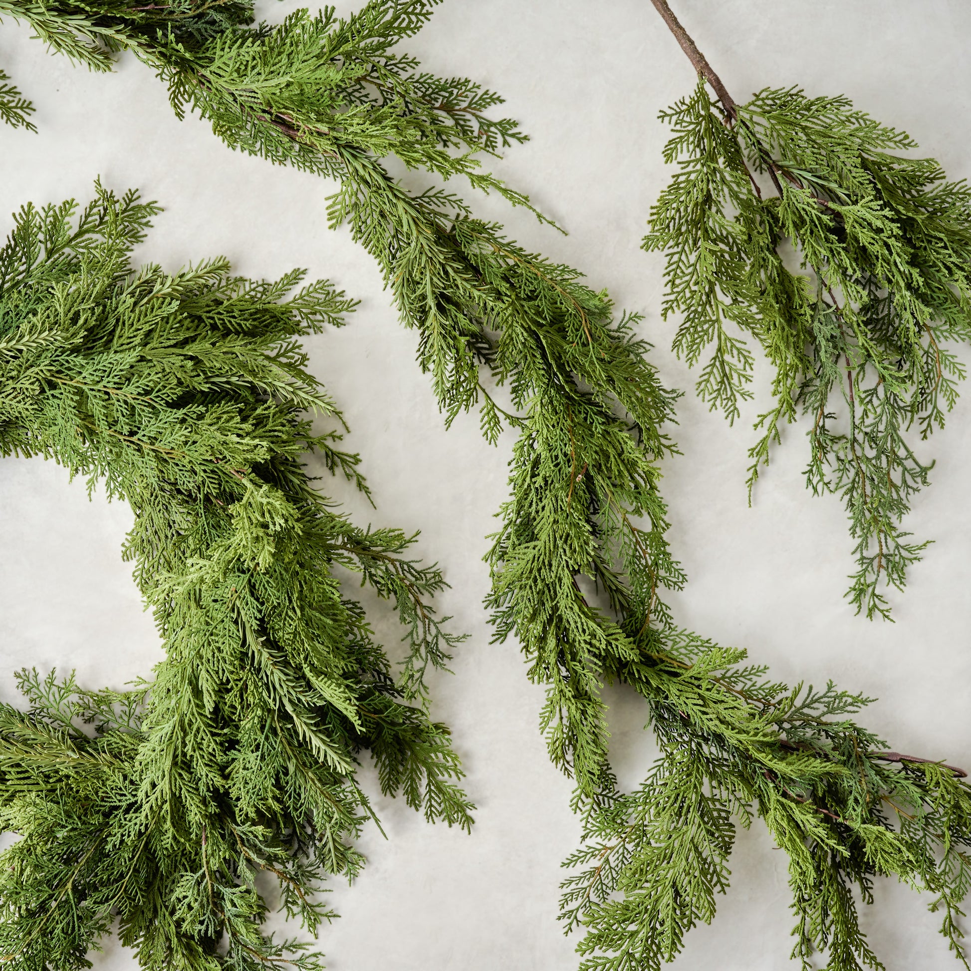 Real Touch Cedar Mix Wreath shown with garland and stem