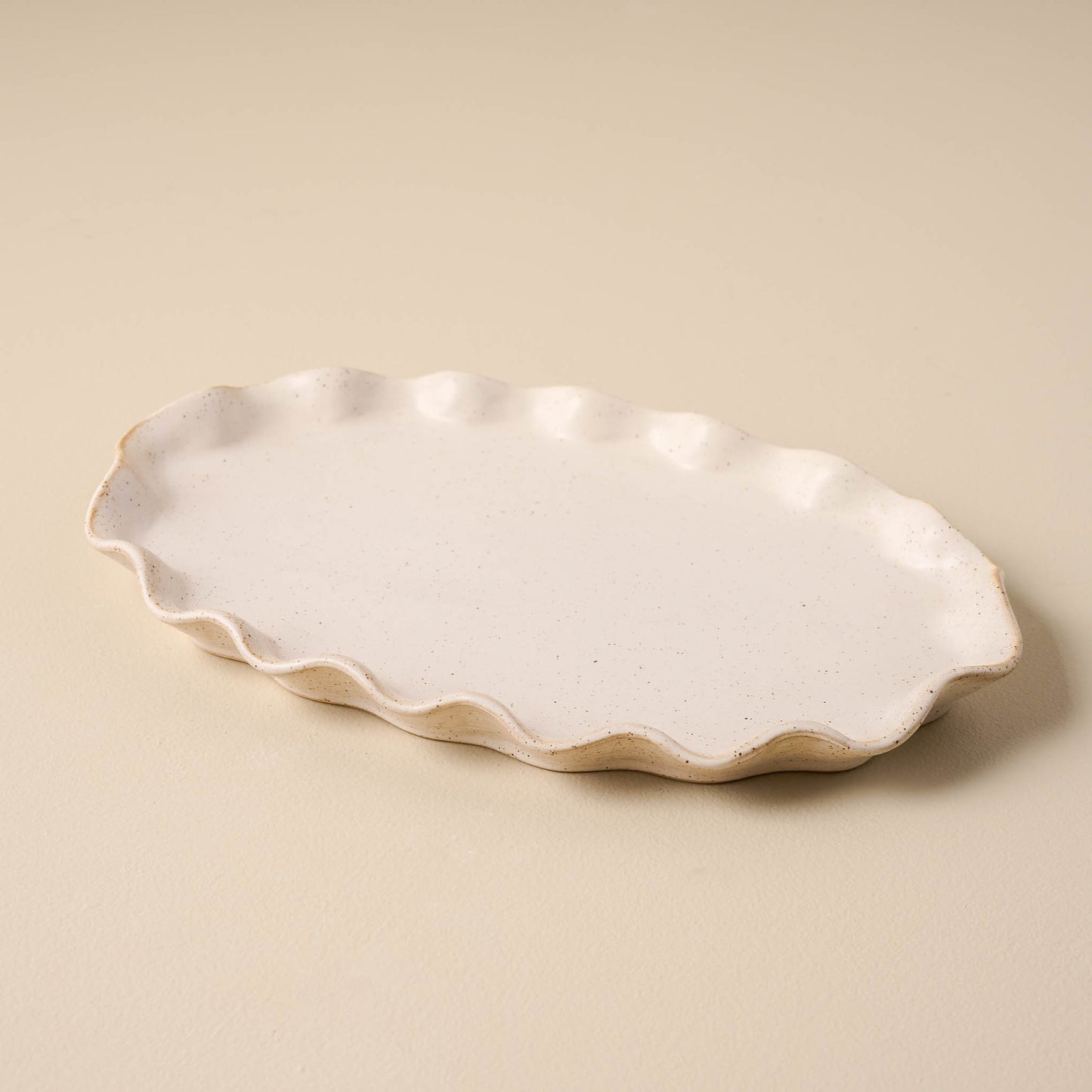 large sized ivory Ceramic tray with ruffled edge