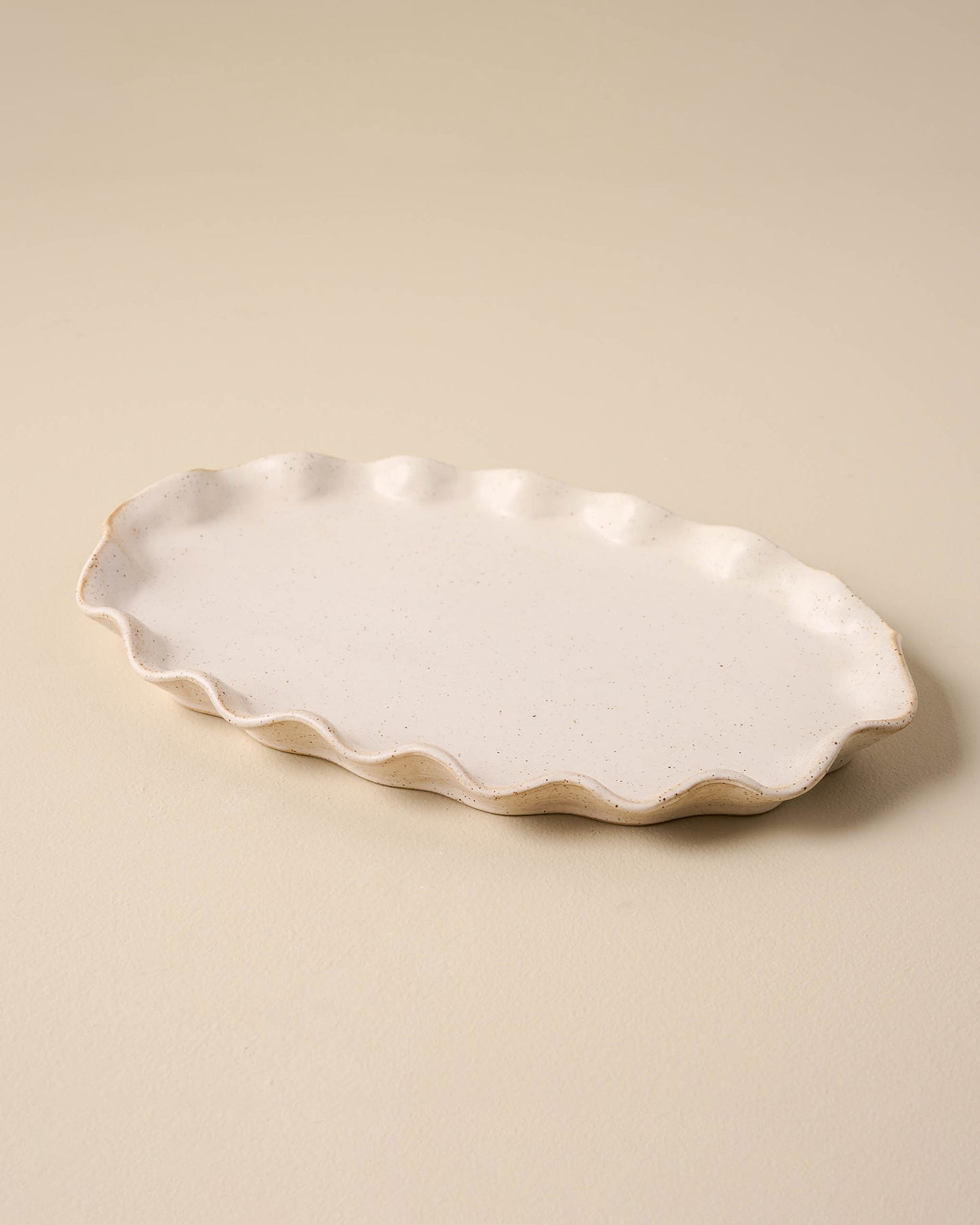 large sized ivory Ceramic tray with ruffled edge