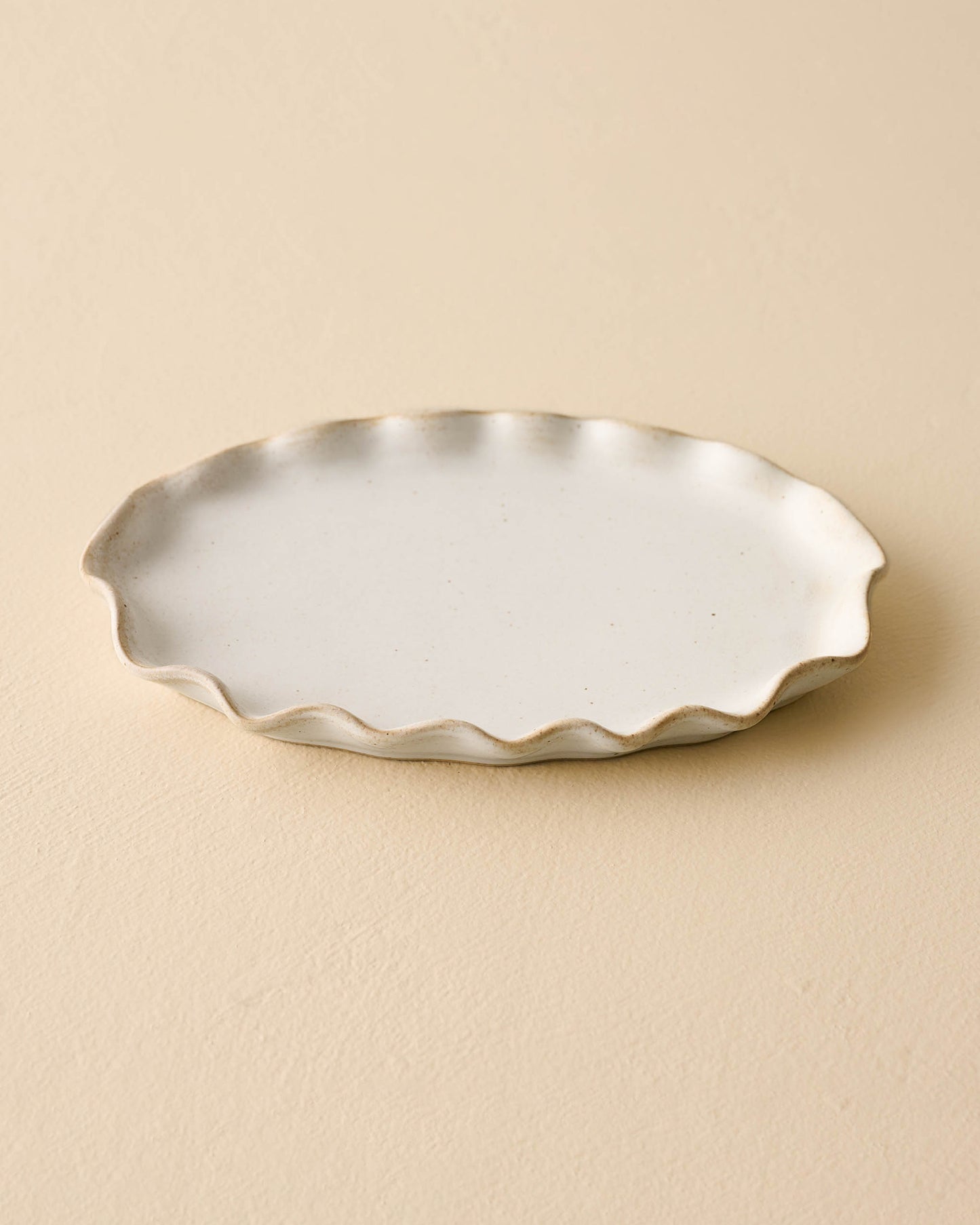 small sized ivory Ceramic tray with ruffled edge